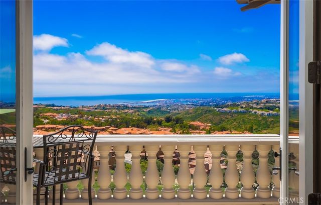 a bedroom with a bed and a table