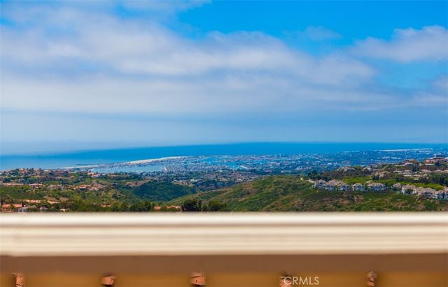 a bathroom with a toilet a sink and a mirror