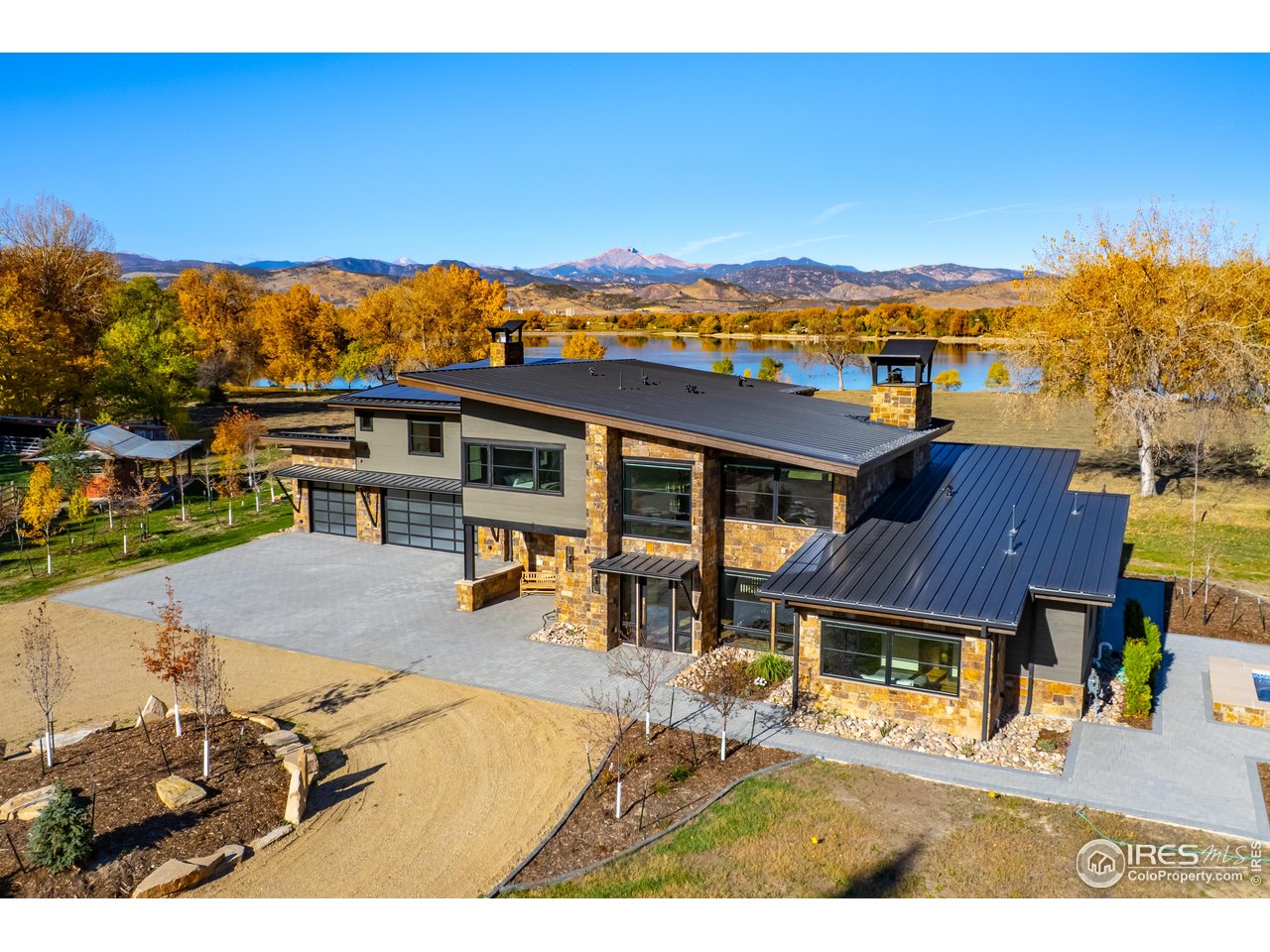 12357 North 75th Street Longmont, CO 80503 - Photo 1 of 49 an aerial view of residential houses and lake view