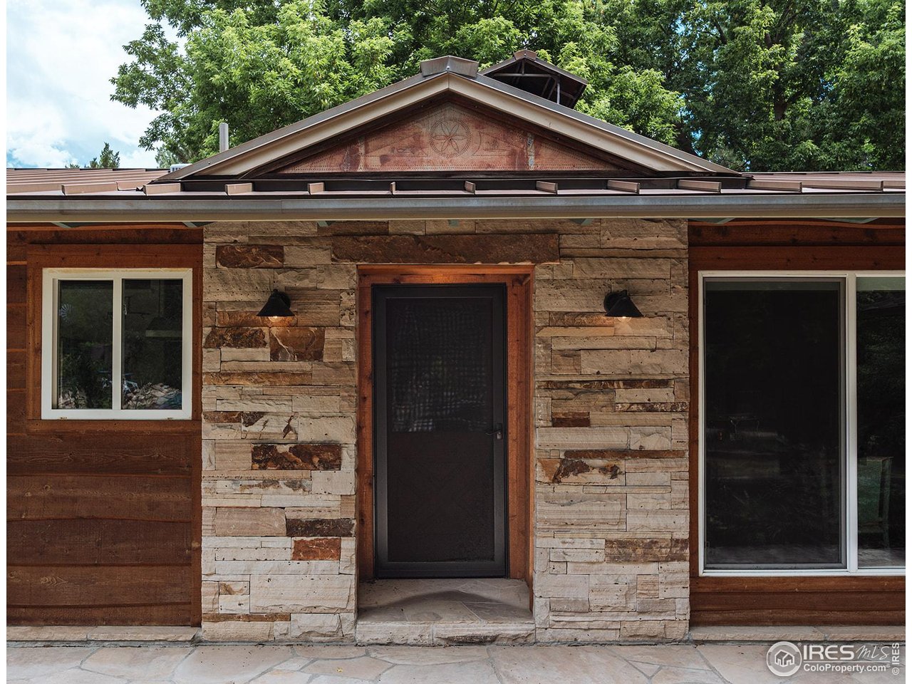 12357 North 75th Street Longmont, CO 80503 - Photo 43 of 49 a front view of a house with a garage