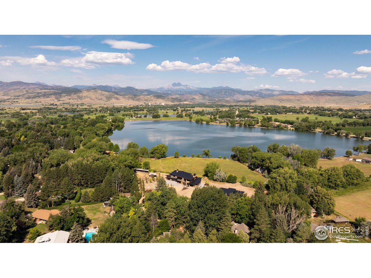 12357 North 75th Street Longmont, CO 80503 - Photo 47 of 49 a picture of a lake with a mountain in the background