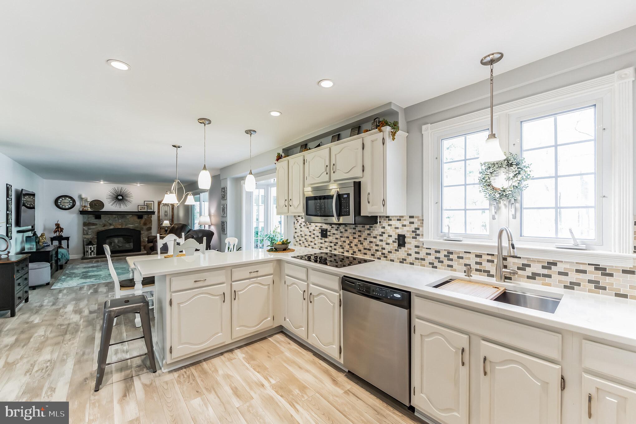355 Peck Road Downingtown, PA 19335 - Photo 8 of 32 Kitchen looking out to Family Room