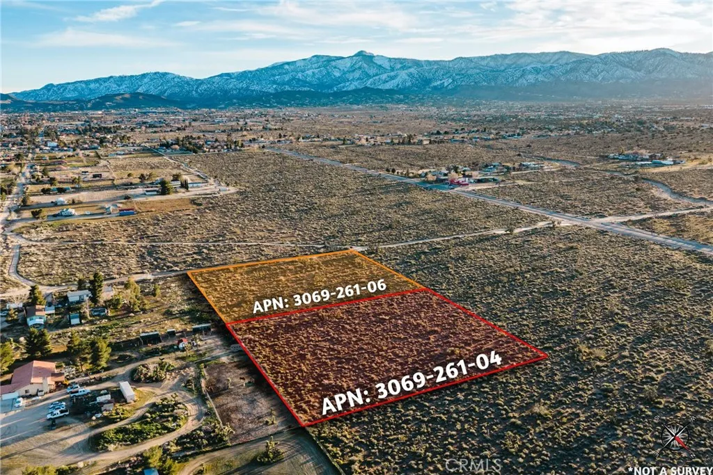 a view of a large body of water with a mountain