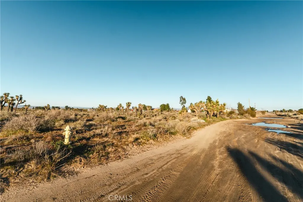 1 Rancho Road Phelan, CA 92371 - Photo 31 of 31 an aerial view of a house with a yard and mountain view in back