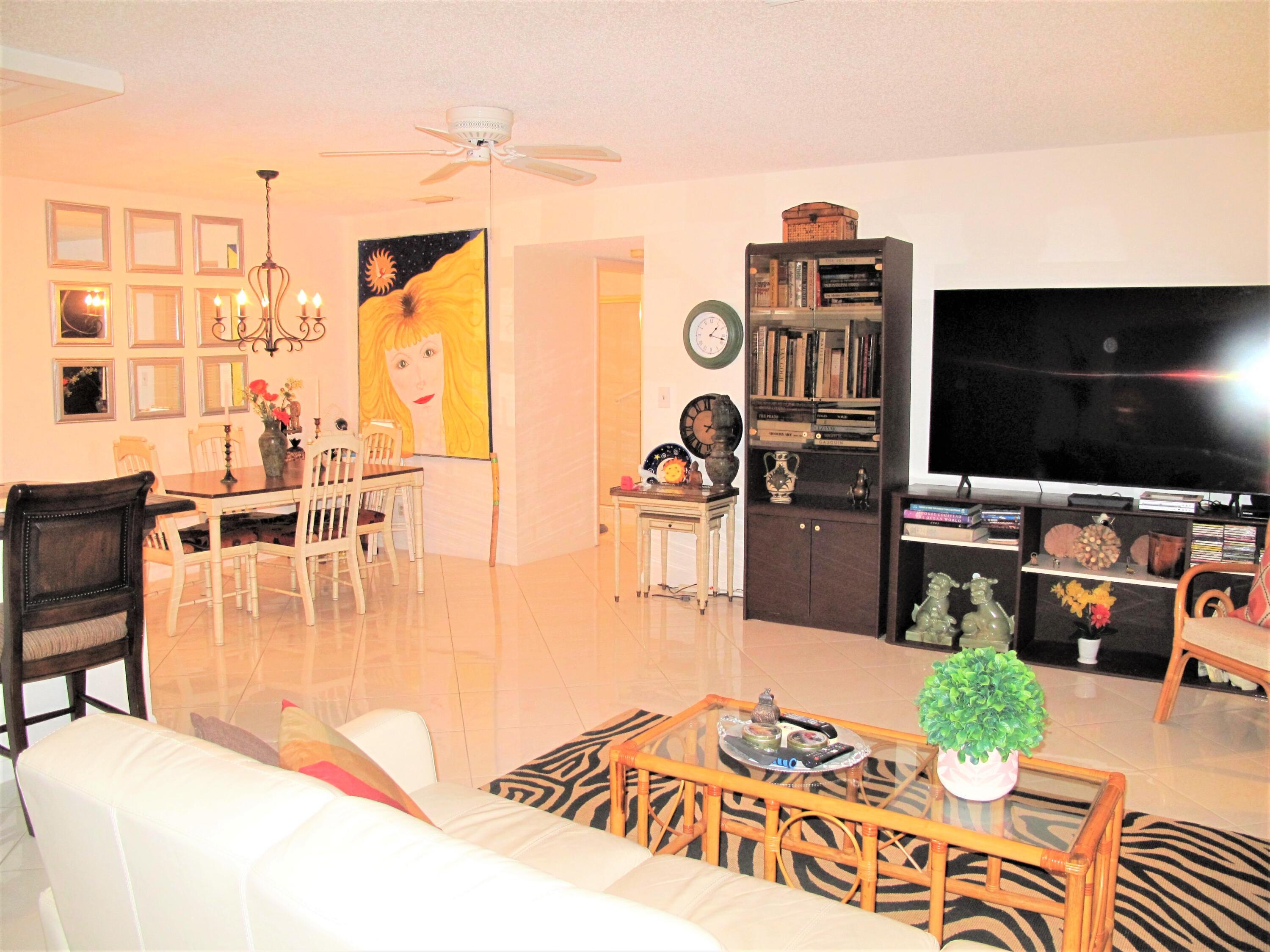 5031 Nesting Way, Unit D Delray Beach, FL 33484 - Photo 16 of 35 Living and dining area view