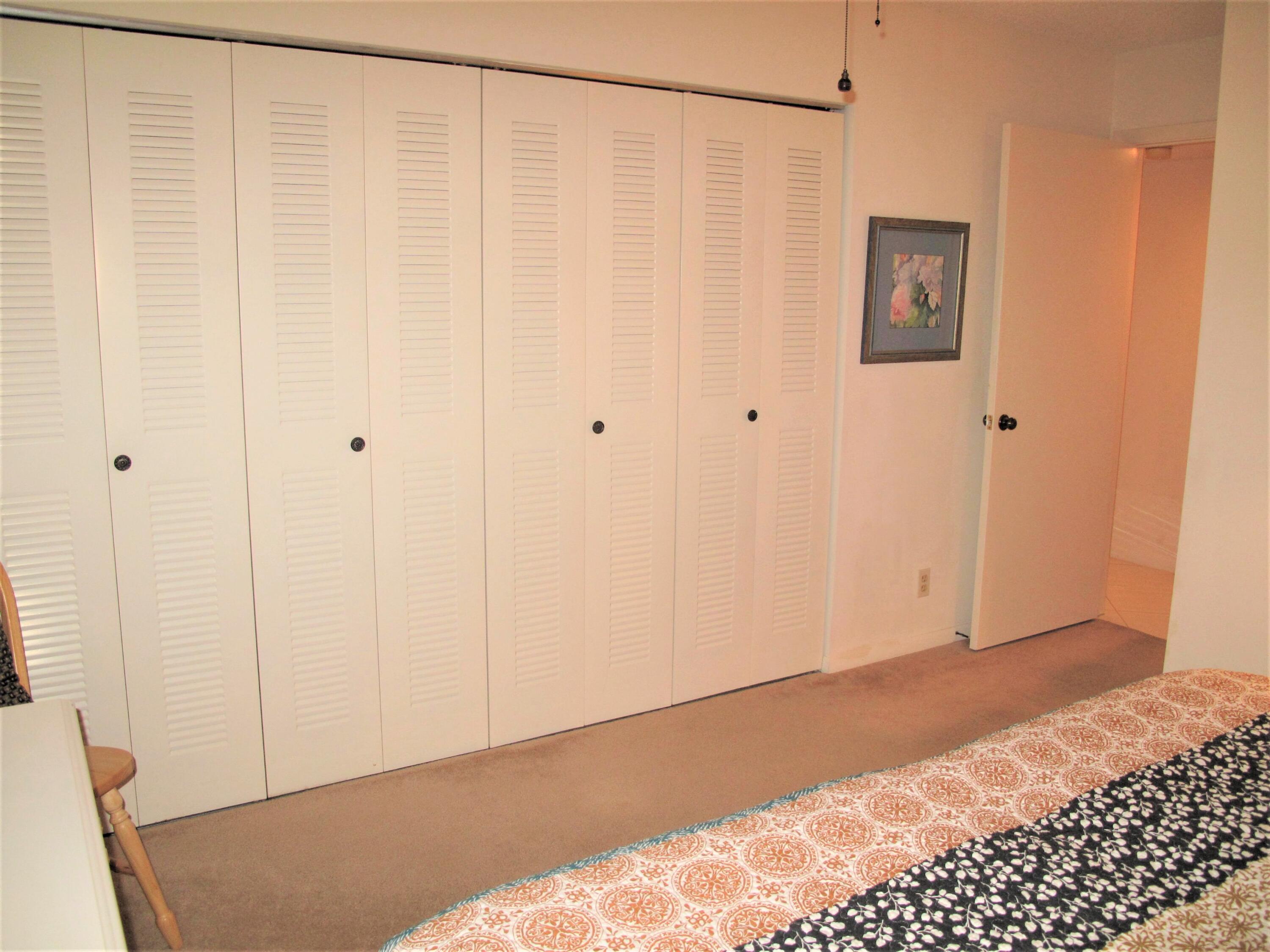 5031 Nesting Way, Unit D Delray Beach, FL 33484 - Photo 19 of 35 Guest bedroom clsoet space