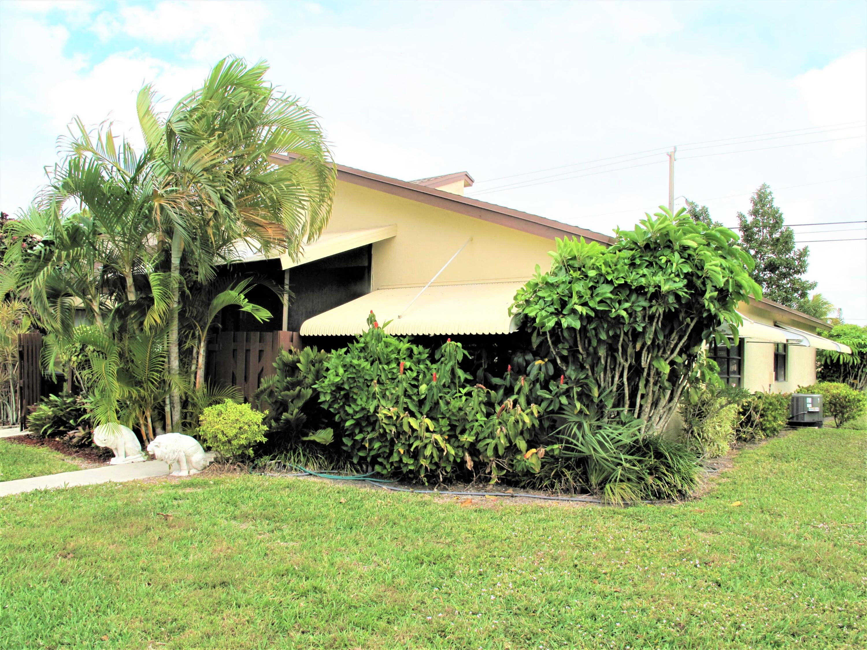 5031 Nesting Way, Unit D Delray Beach, FL 33484 - Photo 2 of 35 Front view of villa (2)