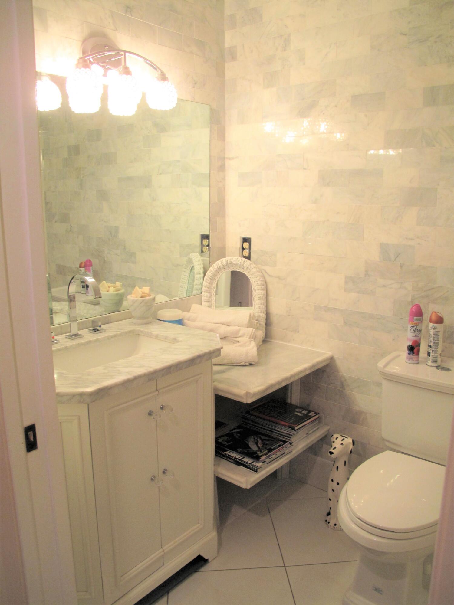 5031 Nesting Way, Unit D Delray Beach, FL 33484 - Photo 21 of 35 Remodeled guest bathroom