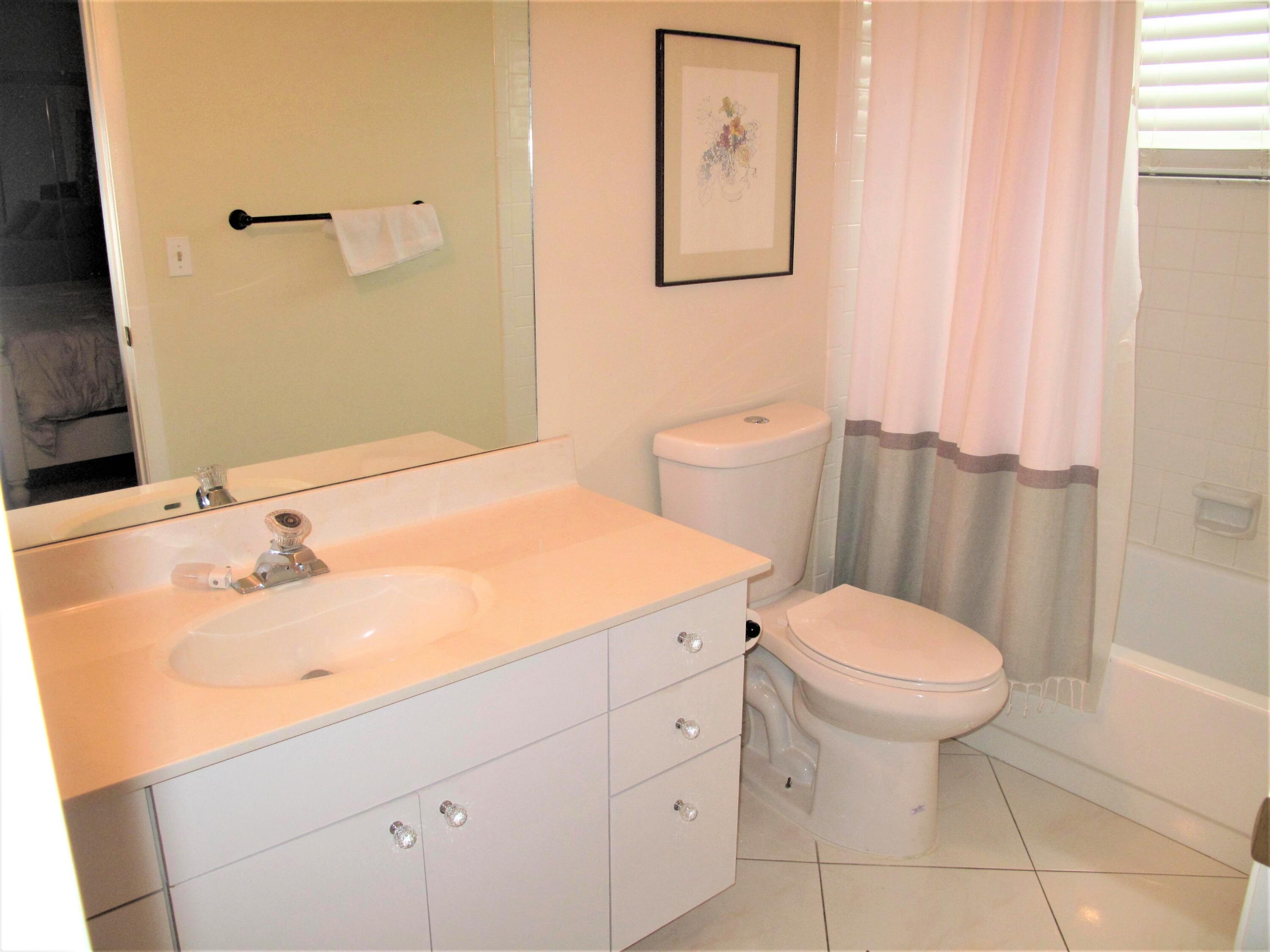 5031 Nesting Way, Unit D Delray Beach, FL 33484 - Photo 23 of 35 Master Bath tub shower combo
