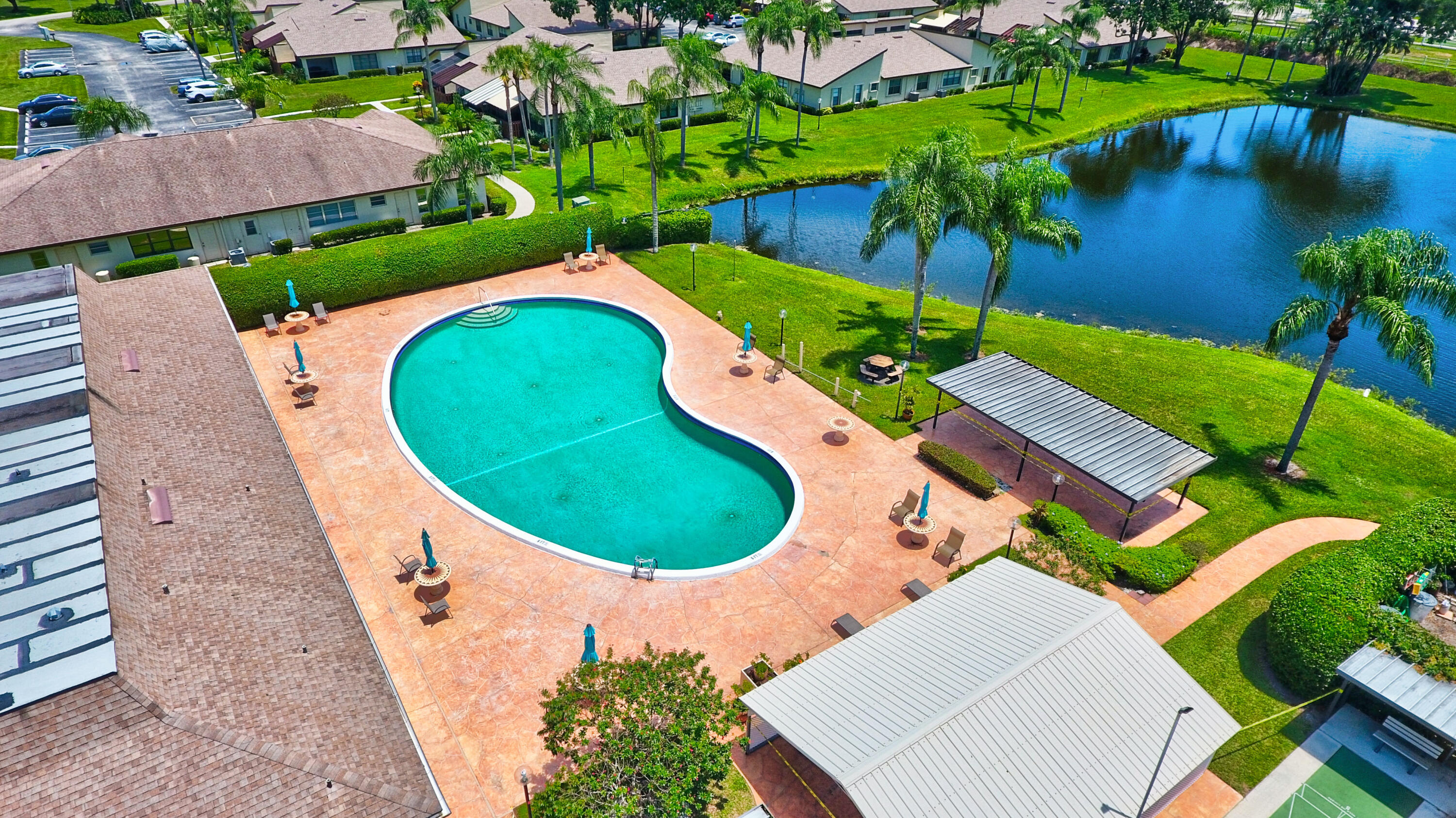 5031 Nesting Way, Unit D Delray Beach, FL 33484 - Photo 27 of 35 Aerial view of HP3W pool and clubhouse