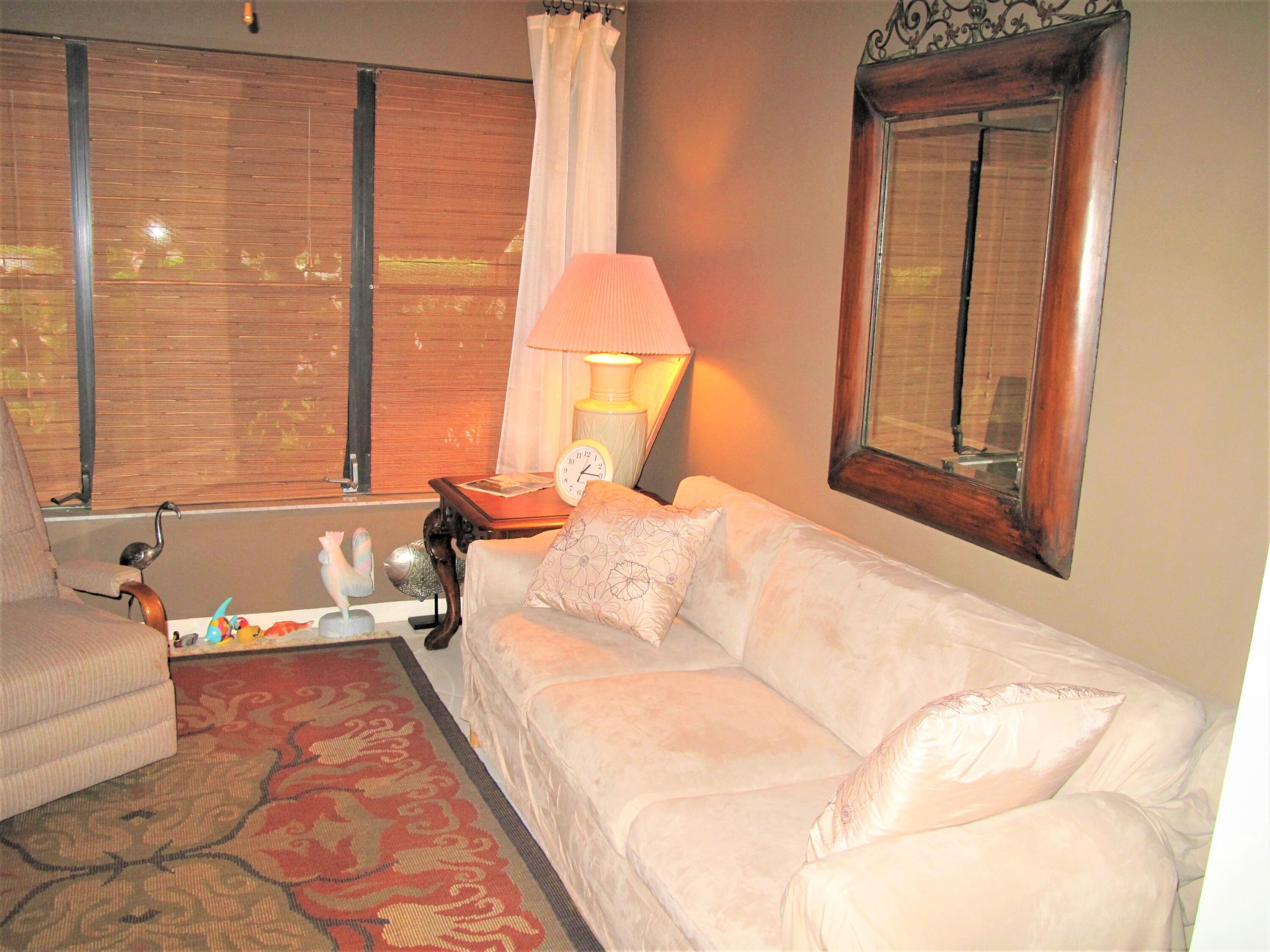 5031 Nesting Way, Unit D Delray Beach, FL 33484 - Photo 6 of 35 Enclosed Florida room