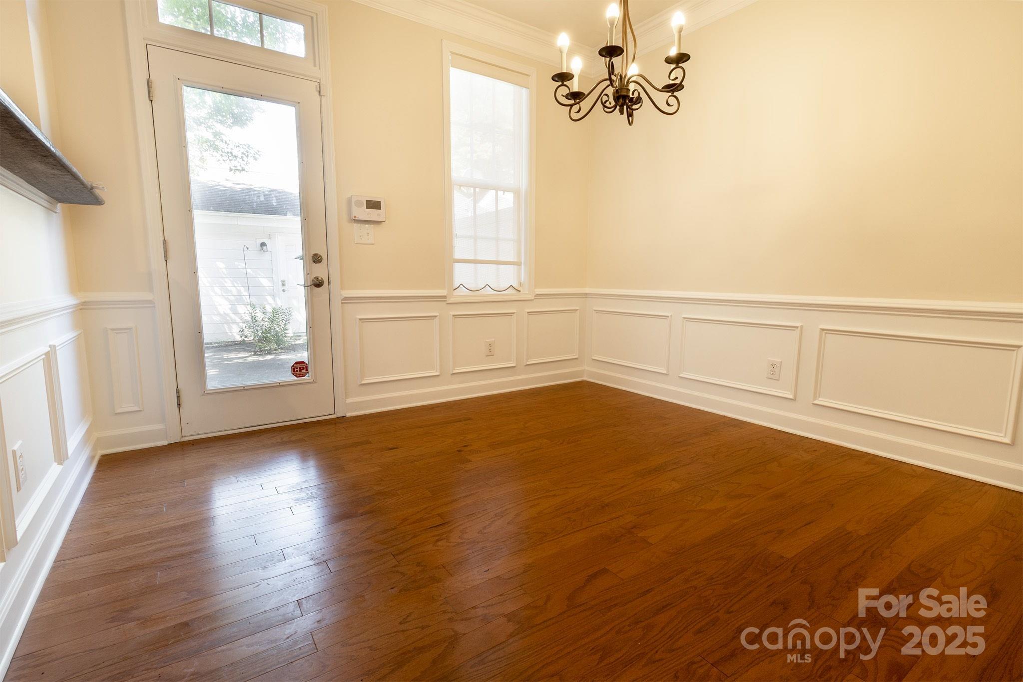 10419 Rocky Ford Club Road Charlotte, NC 28078 - Photo 12 of 37 a view of a room with rack on the wall and a window