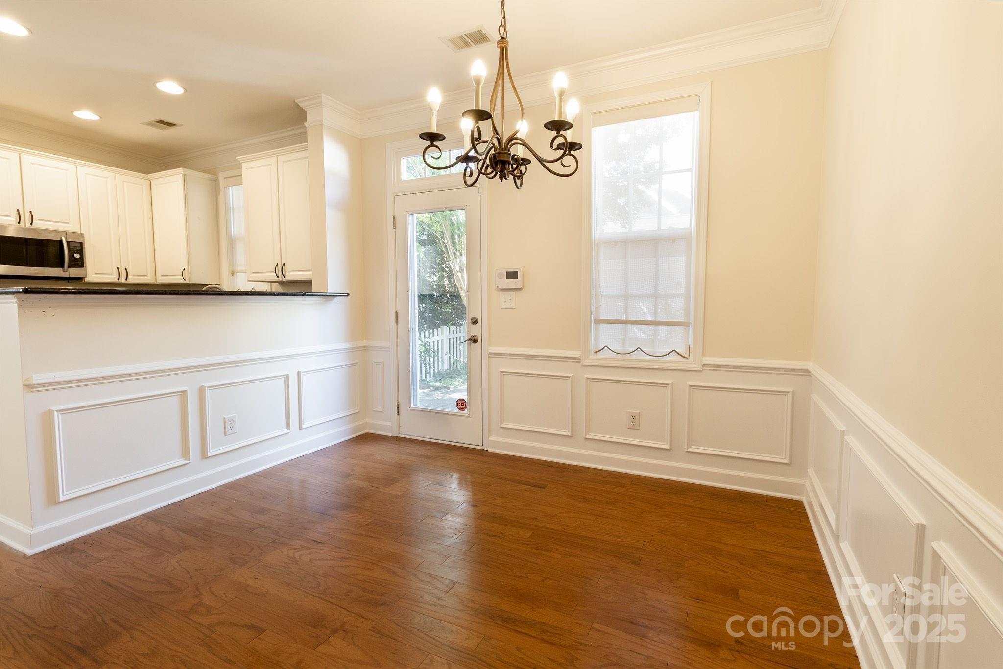 10419 Rocky Ford Club Road Charlotte, NC 28078 - Photo 13 of 37 a view of an empty room with window and cabinet