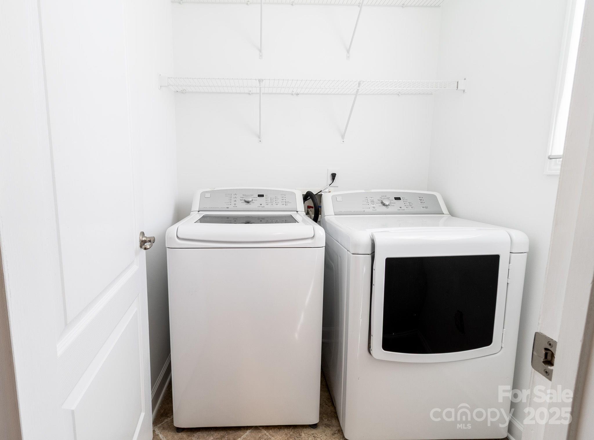 10419 Rocky Ford Club Road Charlotte, NC 28078 - Photo 18 of 37 a utility room with dryer and washer