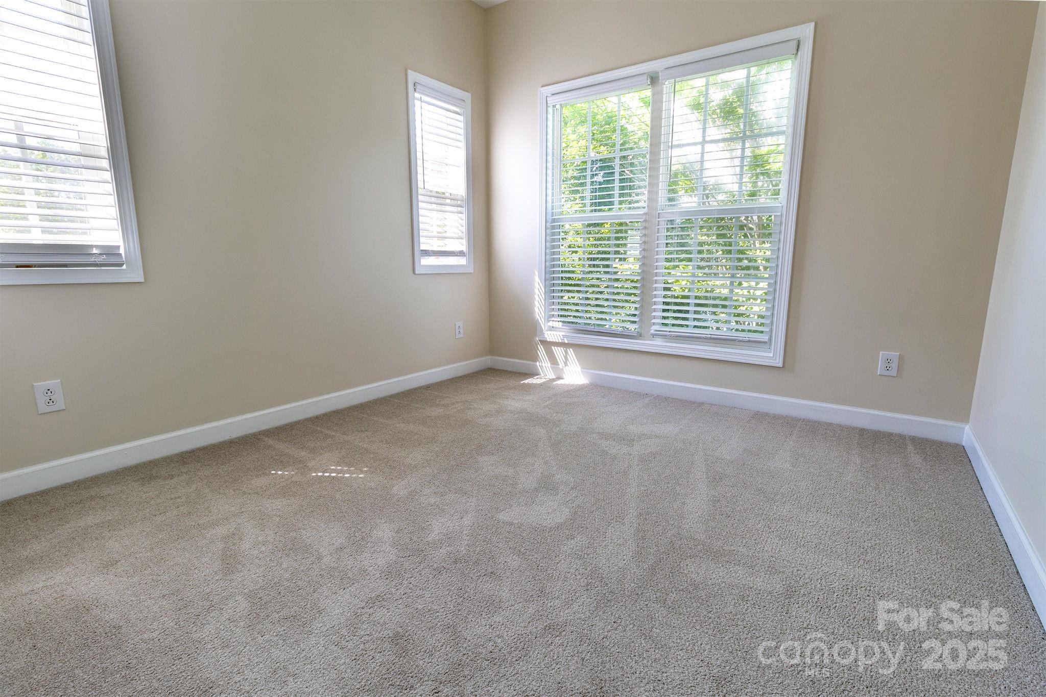 10419 Rocky Ford Club Road Charlotte, NC 28078 - Photo 22 of 37 an empty room with a window