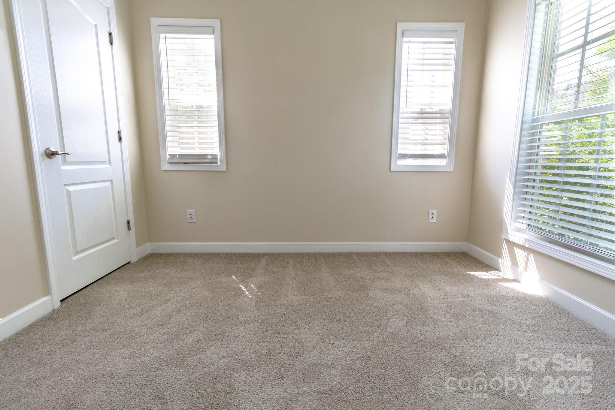 10419 Rocky Ford Club Road Charlotte, NC 28078 - Photo 23 of 37 an empty room with windows