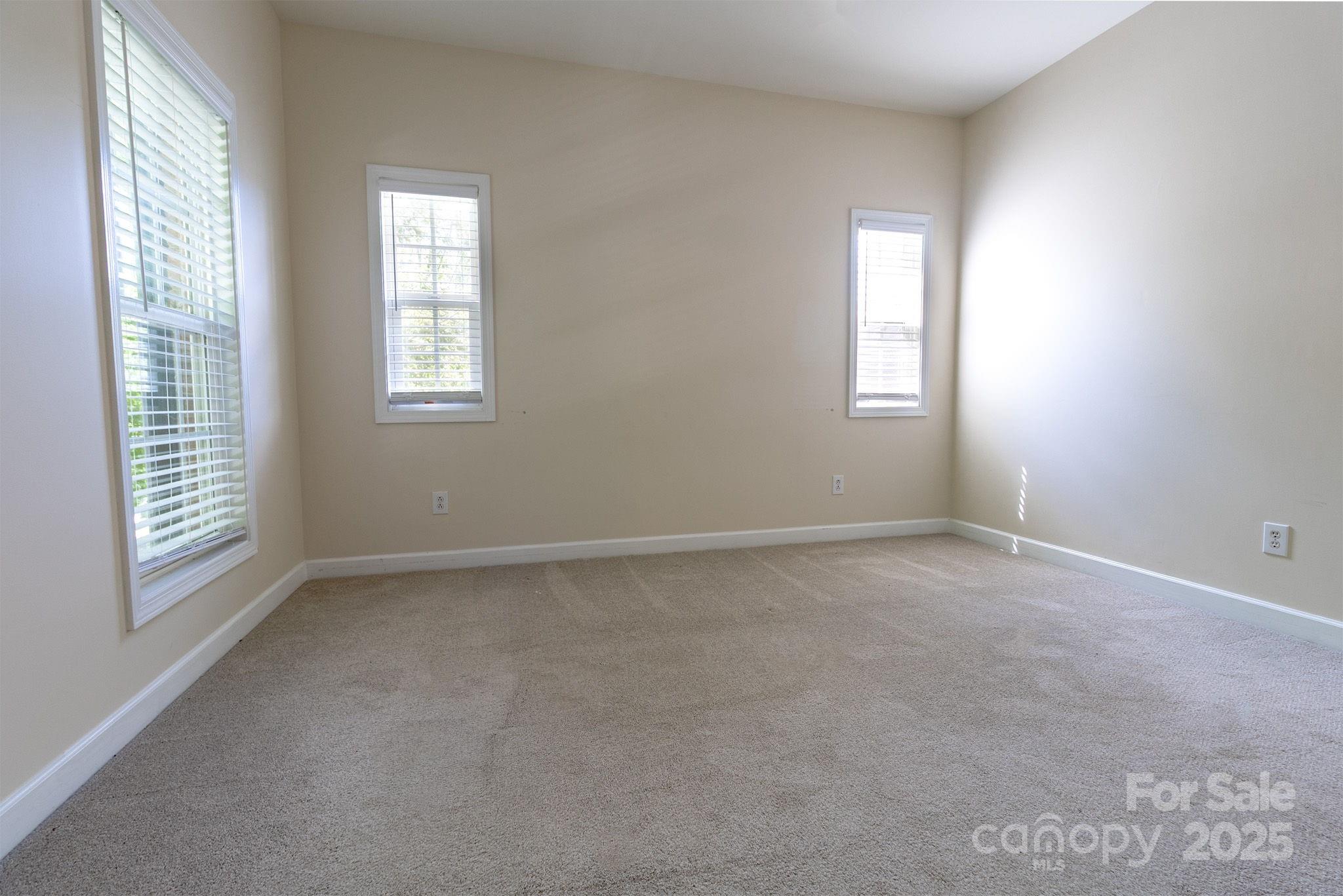 10419 Rocky Ford Club Road Charlotte, NC 28078 - Photo 27 of 37 a view of an empty room with a window