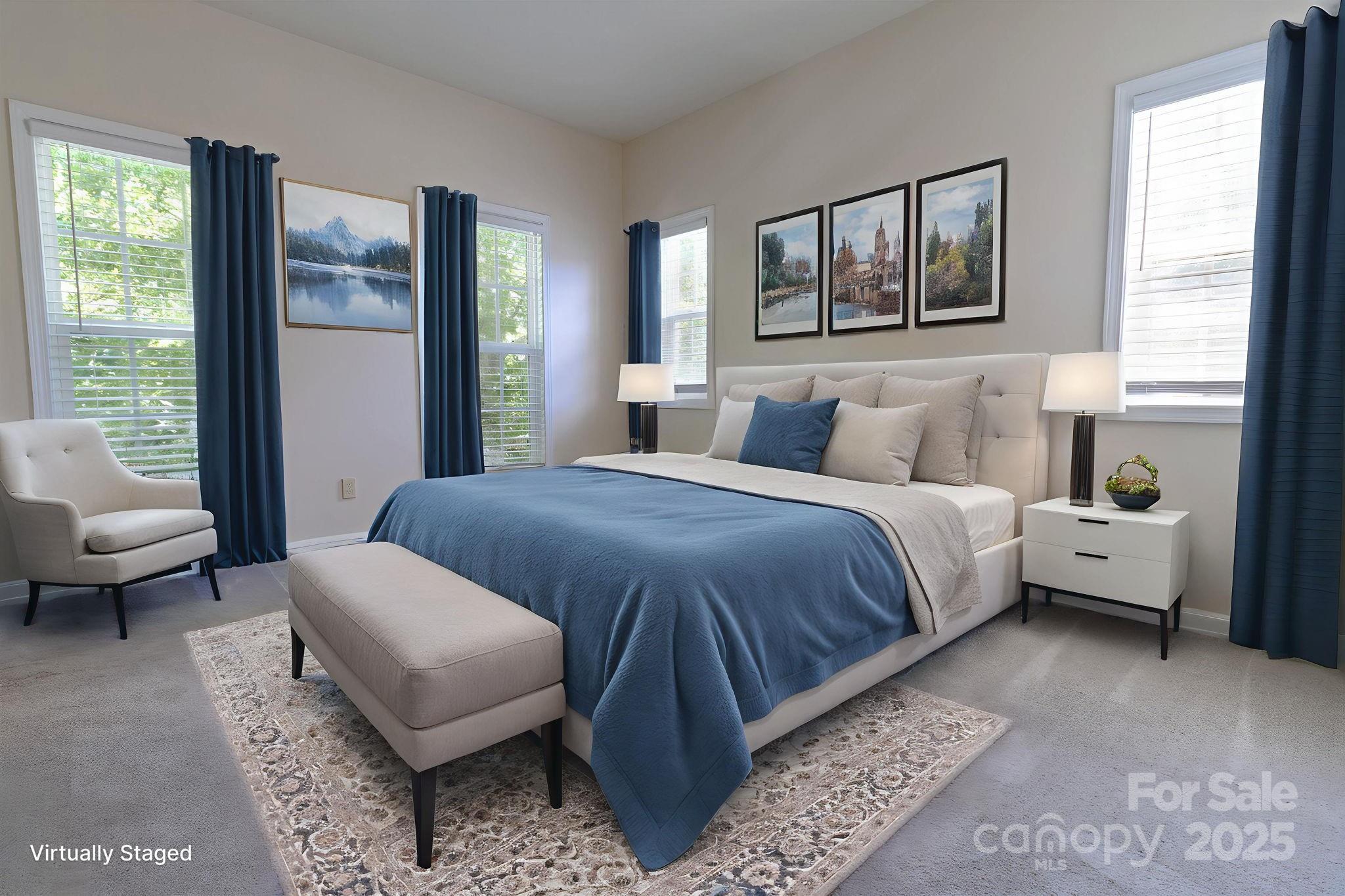 10419 Rocky Ford Club Road Charlotte, NC 28078 - Photo 28 of 37 a bedroom with a bed couch and window