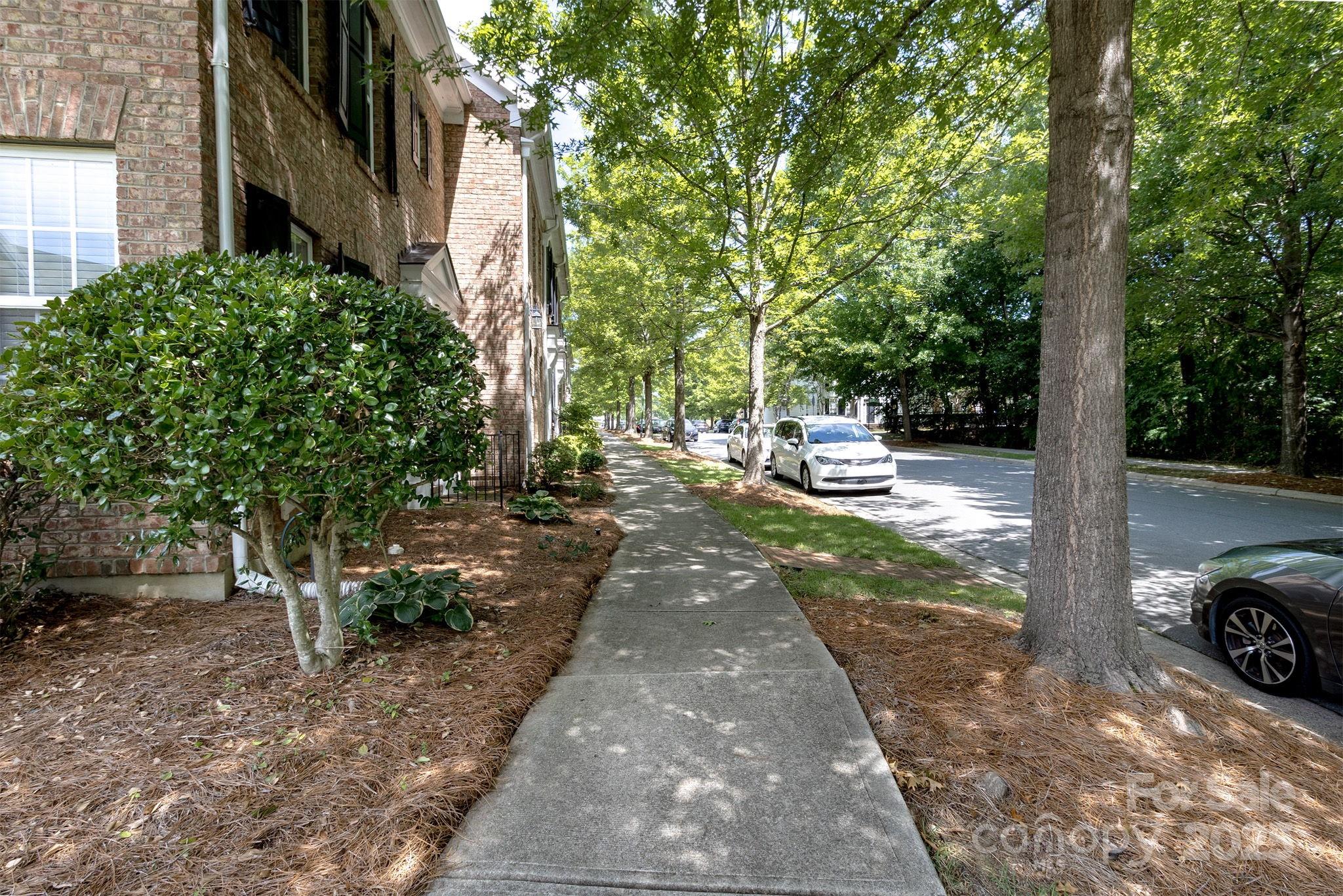 10419 Rocky Ford Club Road Charlotte, NC 28078 - Photo 3 of 37 a view of a park with trees and plants