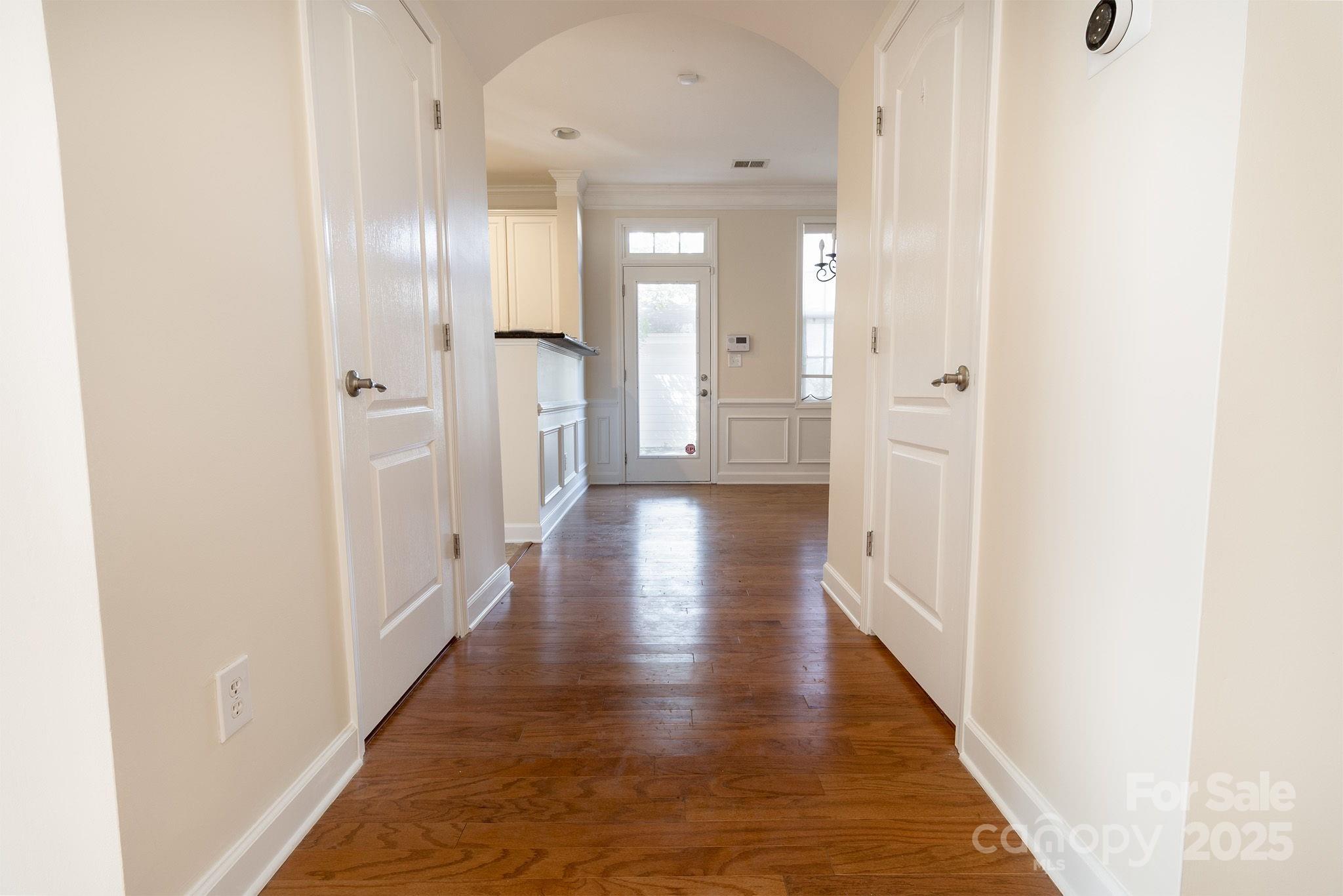 10419 Rocky Ford Club Road Charlotte, NC 28078 - Photo 10 of 37 a view of a hallway with wooden floor