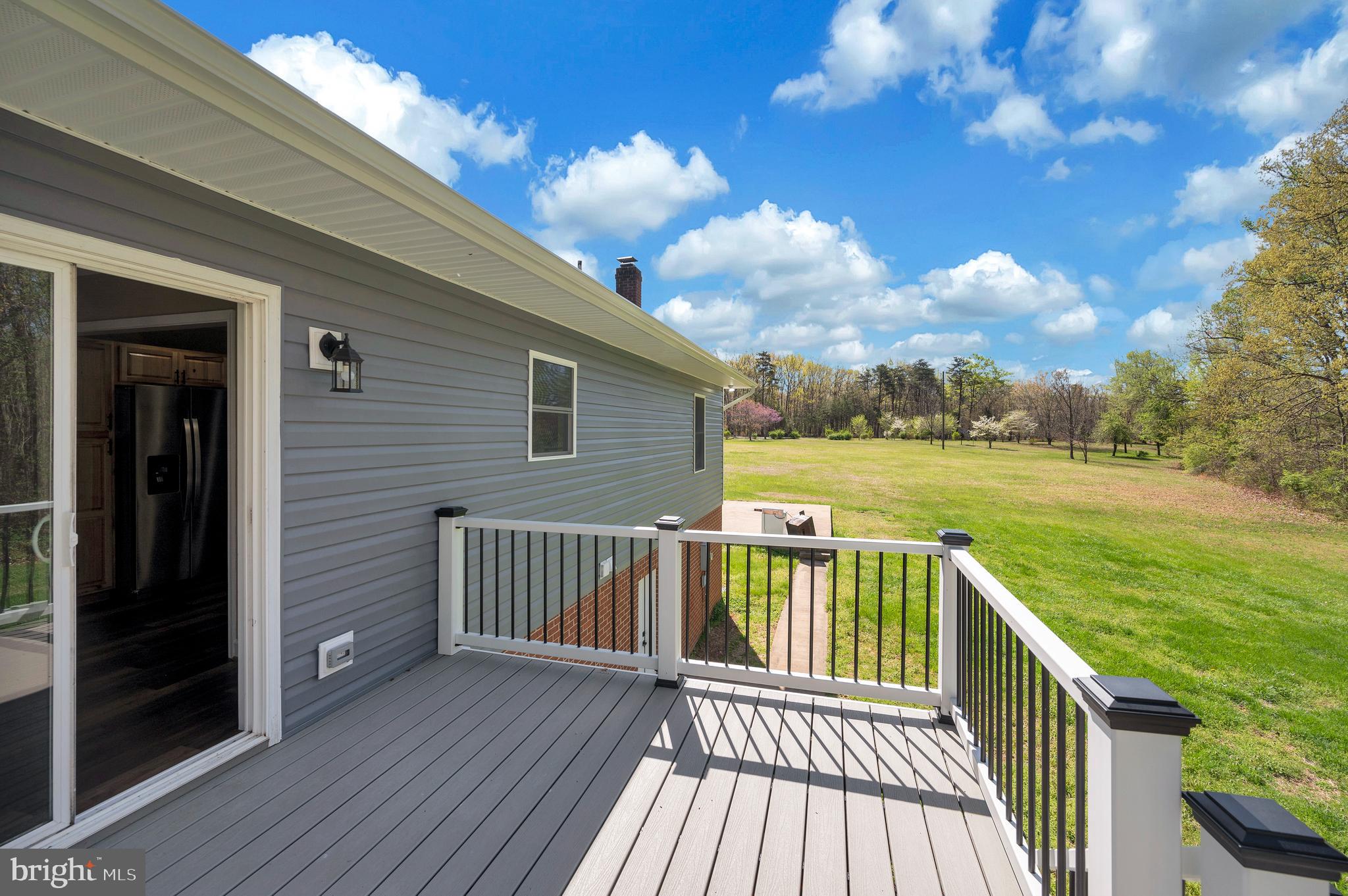 13452 Post Oak Road Spotsylvania, VA 22551 - Photo 54 of 56 a view of a balcony with wooden floor