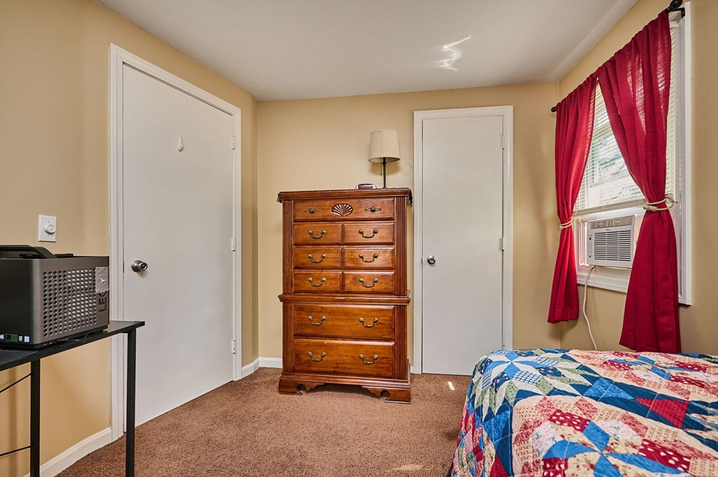 50 Phelps Street Easthampton, MA 01027 - Photo 13 of 38 a bedroom with a bed and a window