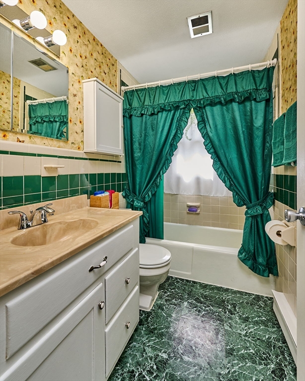 50 Phelps Street Easthampton, MA 01027 - Photo 16 of 38 a bathroom with a sink toilet and tub