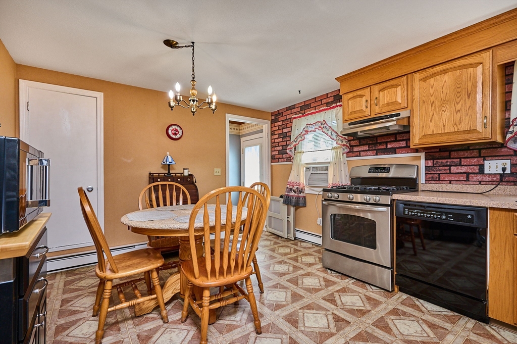 50 Phelps Street Easthampton, MA 01027 - Photo 6 of 38 a view of a dining room with furniture window and wooden floor