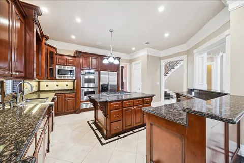 a kitchen with granite countertop lots of counter top space