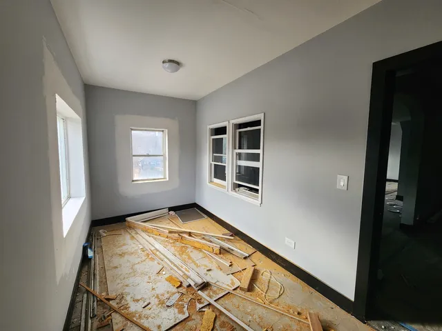 a view of an empty room and window