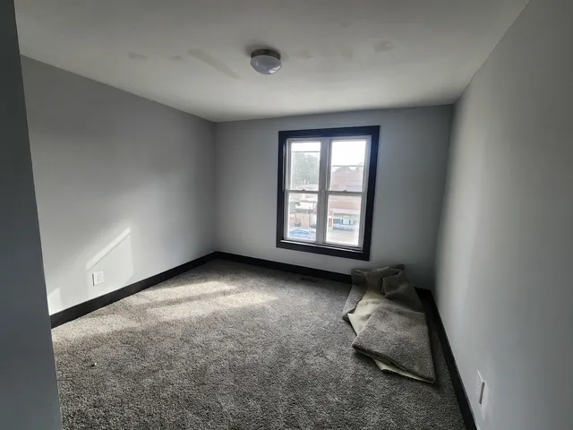 a view of a hallway with closet