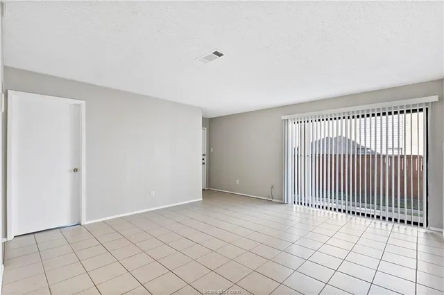 a view of a livingroom with a rug