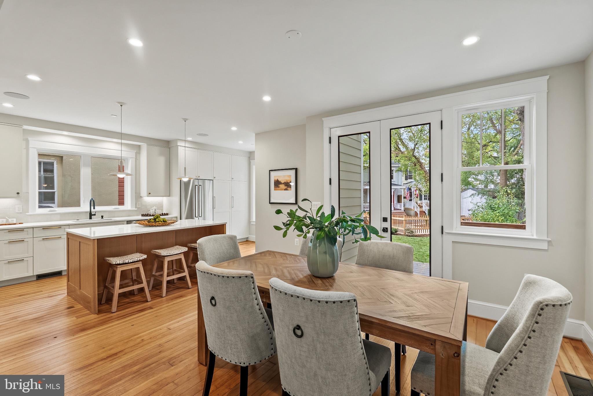 48 Murray Avenue Annapolis, MD 21401 - Photo 11 of 39 a dining room with furniture potted plants and wooden floor