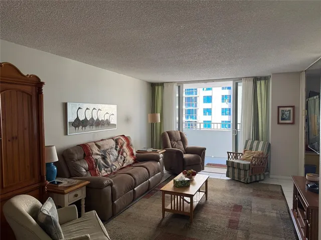 a view of a swimming pool with a terrace