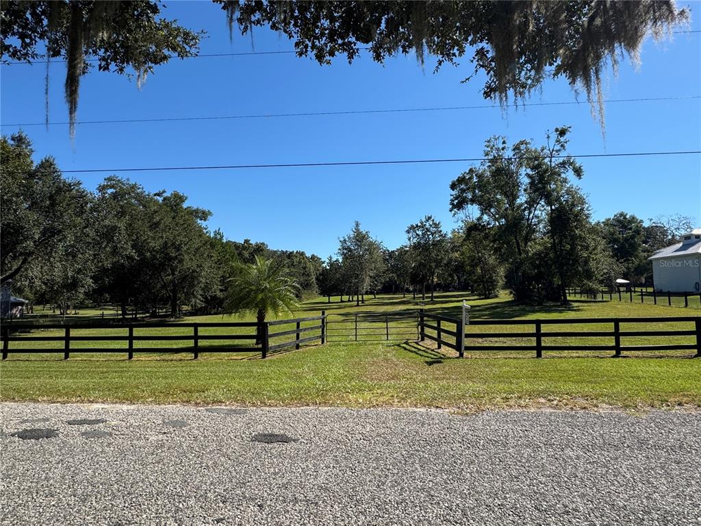 Tbd Northeast 185th Avenue Williston, FL 32696 - Photo 20 of 25 a view of a park with a bench