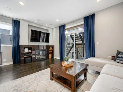 a living room with furniture and a table