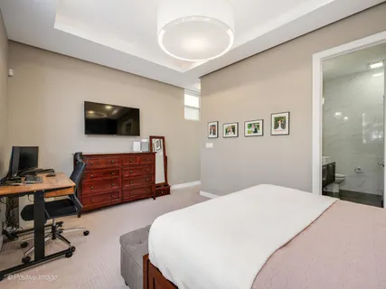 a bathroom with a double vanity sink mirror and shower