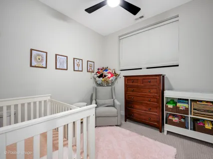 a bathroom with a sink toilet and a mirror