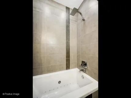 a view of washer and dryer in a utility room