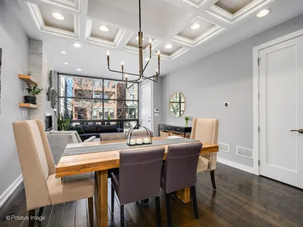 a kitchen with center island and stainless steel appliances