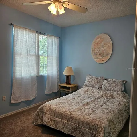 a view of an empty room and workspace