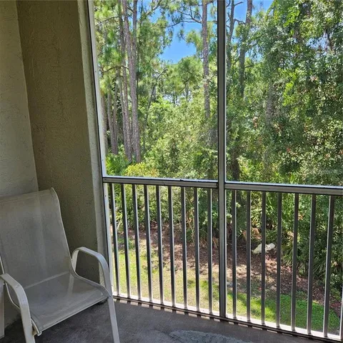 a view of a garden from a balcony