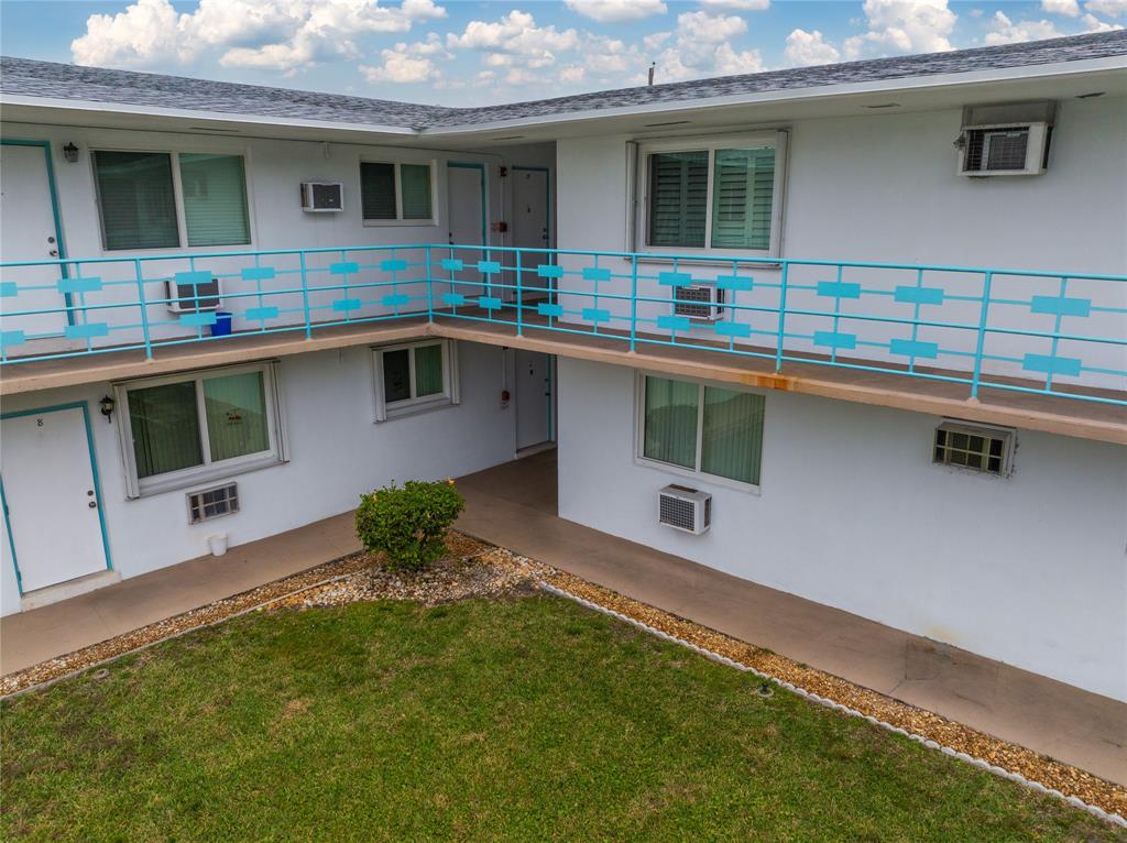 3525 Tyler Street, Unit 9 Hollywood, FL 33021 - Photo 13 of 24 a house view with a outdoor space