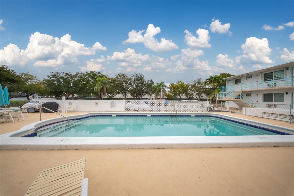 3525 Tyler Street, Unit 9 Hollywood, FL 33021 - Photo 17 of 24 a view of a garden