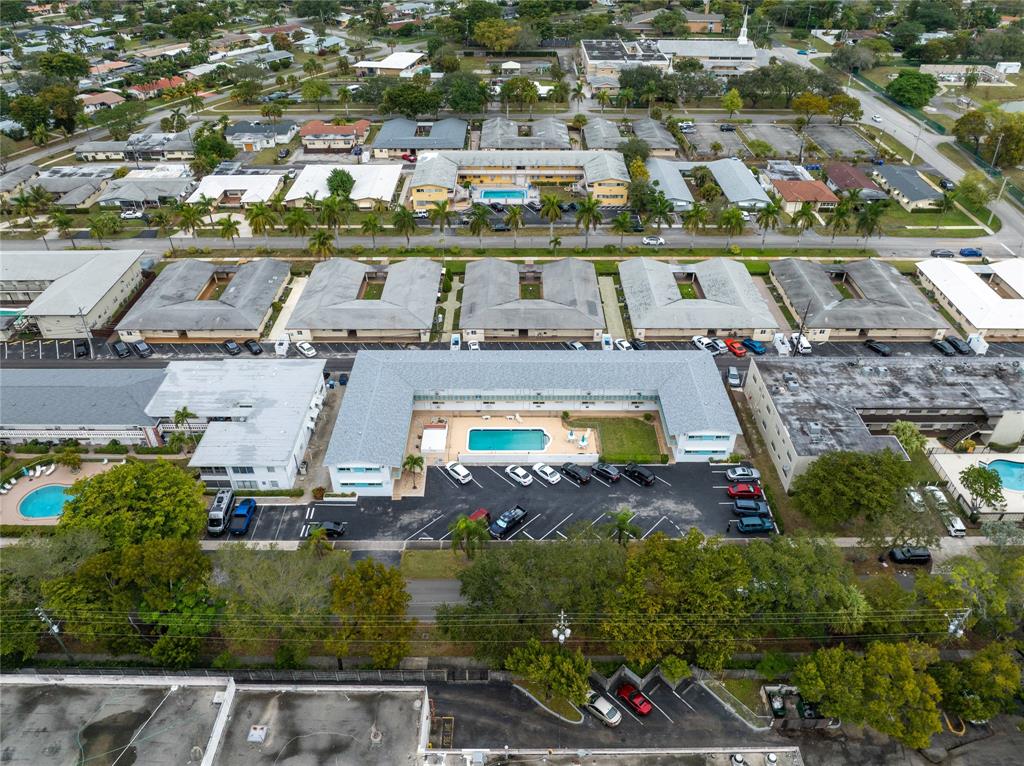 3525 Tyler Street, Unit 9 Hollywood, FL 33021 - Photo 21 of 24 an aerial view of a house with a lake view