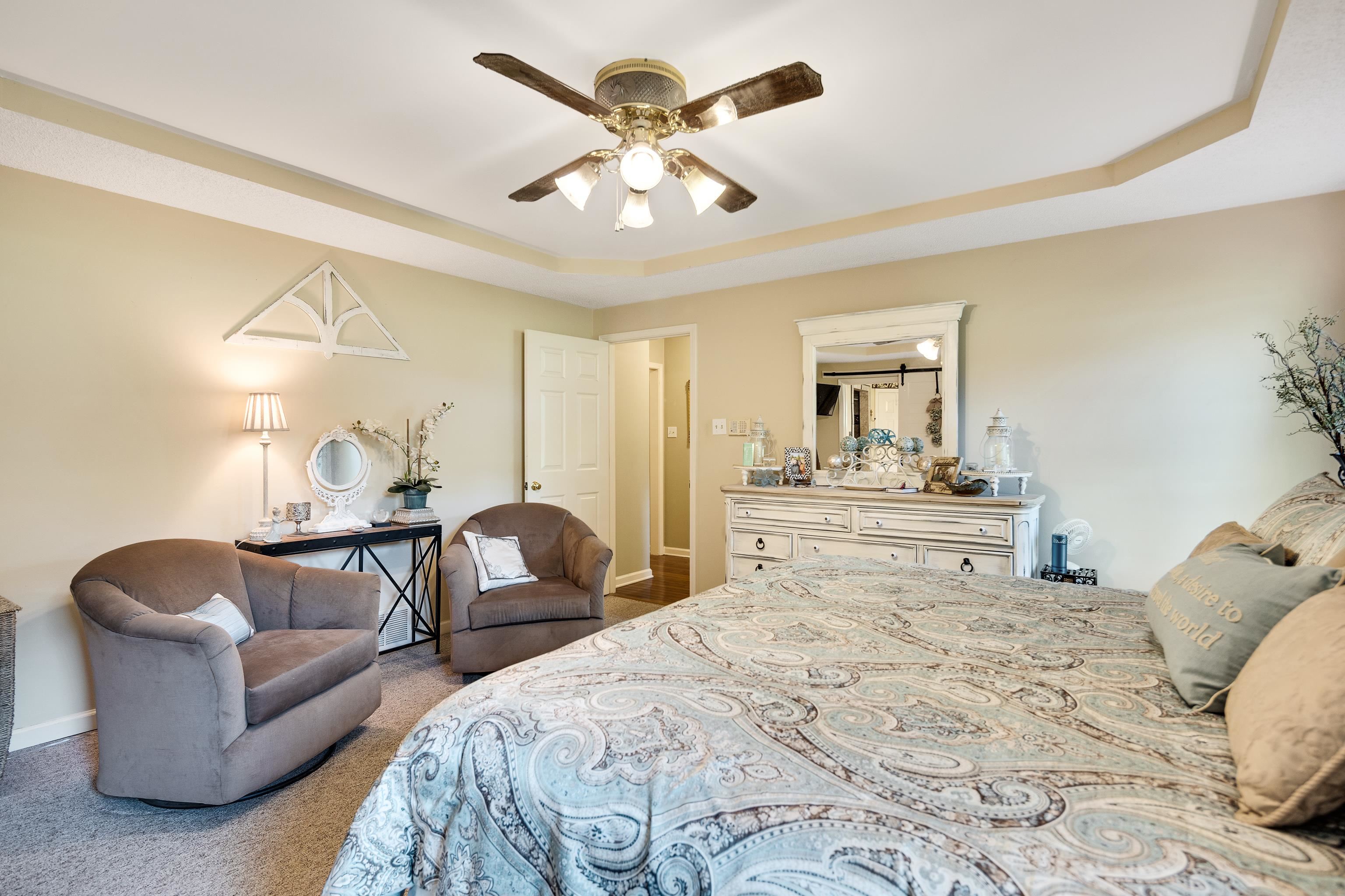 6119 Brunswick Road Arlington, TN 38002 - Photo 18 of 39 a bedroom with a bed and ceiling fan