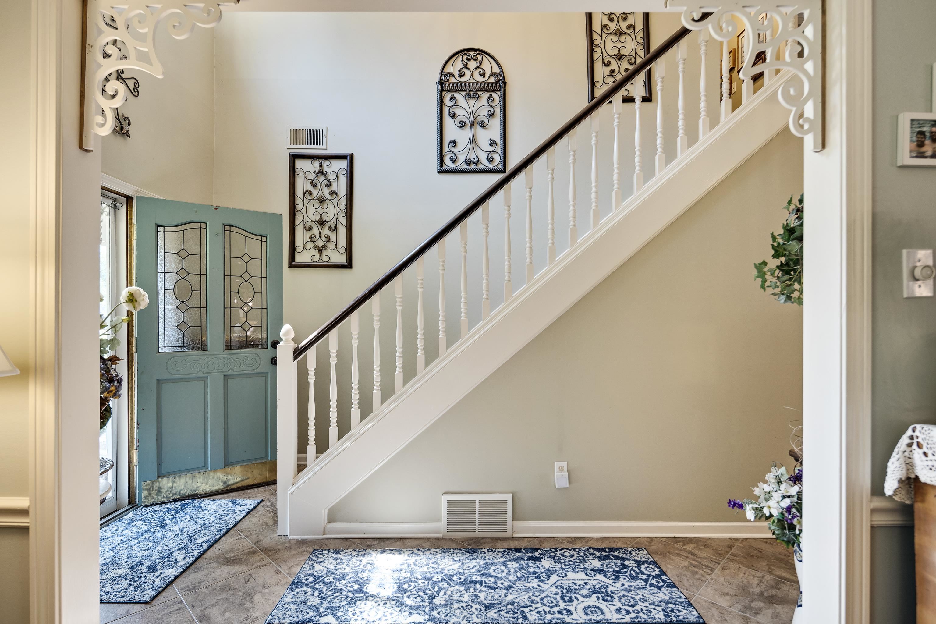 6119 Brunswick Road Arlington, TN 38002 - Photo 6 of 39 a view of staircase with wooden floor and a rug