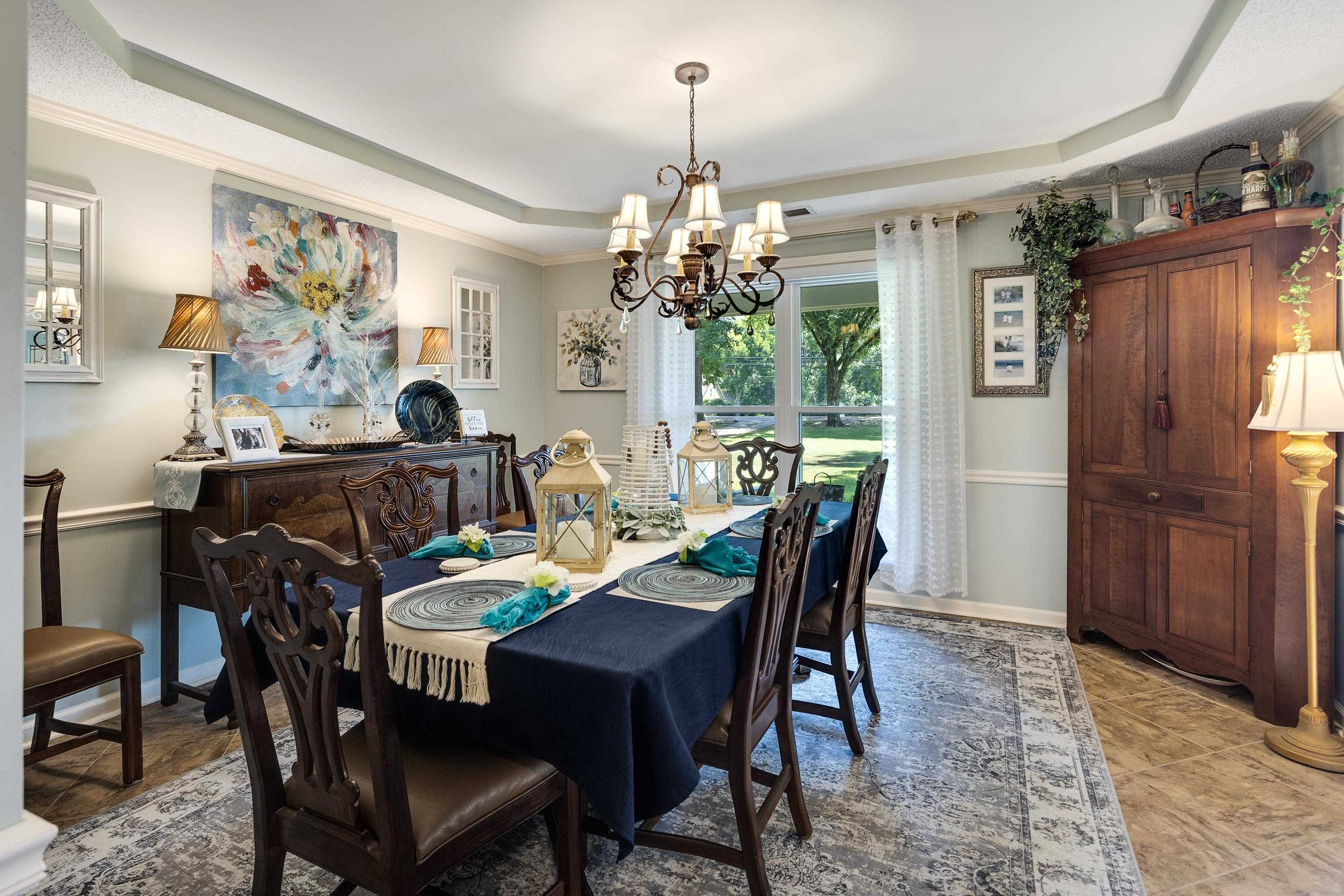 6119 Brunswick Road Arlington, TN 38002 - Photo 9 of 39 a view of a dining room with furniture window and wooden floor