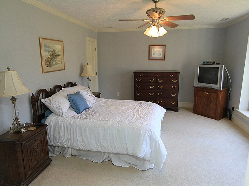 5016 Trail Ridge Drive Raleigh, NC 27613 - Photo 14 of 25 Master Bedroom is a very nice size with a big walk-in closet you can enter from either end. Master Bedroom