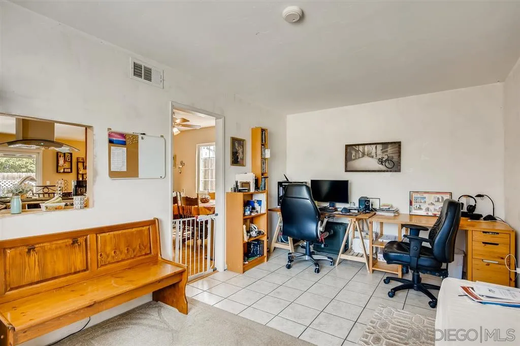 9809 Medina Drive Santee, CA 92071 - Photo 11 of 22 a view of a livingroom with workspace and a couch